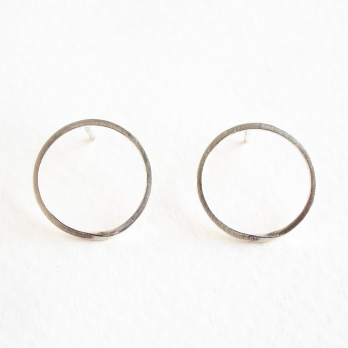 Silver Circle Studs with a Twist
